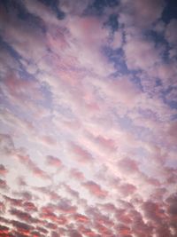 Low angle view of clouds in sky during sunset