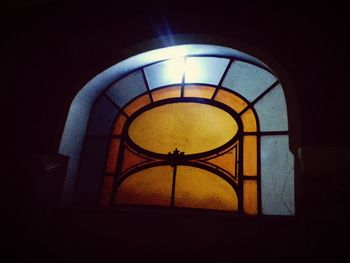 Low angle view of illuminated ceiling