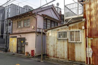 Alley amidst buildings in city