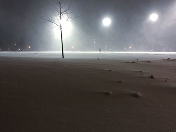 Illuminated street light at night