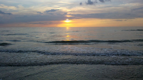 Scenic view of sea at sunset