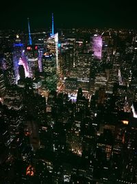 Illuminated cityscape at night