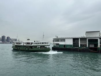 Boats in sea against sky