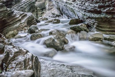 Long exposure of stream amidst rocks