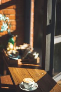 Coffee cup on table in cafe