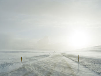 Scenic view of sea against sky during winter