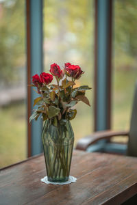 Close-up of flower vase on table