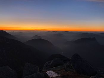 Scenic view of mountains against sky during sunset