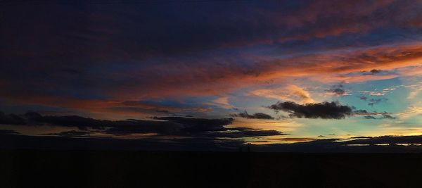 Scenic view of dramatic sky during sunset