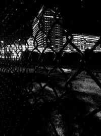 Chainlink fence at night