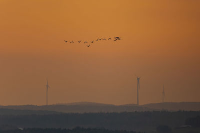 Scenic view of orange sky