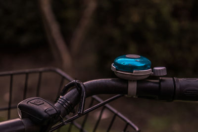 Close-up of bicycle on railing