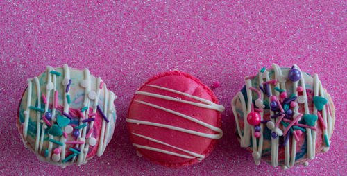 High angle view of multi colored candies on table