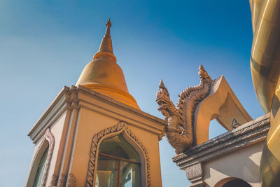 Low angle view of statue of building against sky