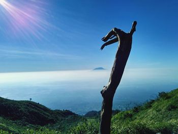 Scenic view of sea against blue sky