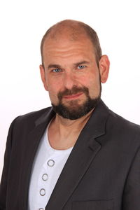 Portrait of man against white background