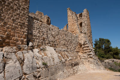 View of old ruin building against sky