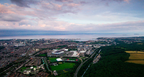 High angle view of buildings in city against sky