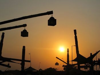 Low angle view of construction site at sunset