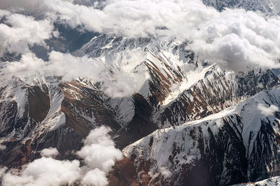 Aerial landscape view of the caucasus mountain range peaks.