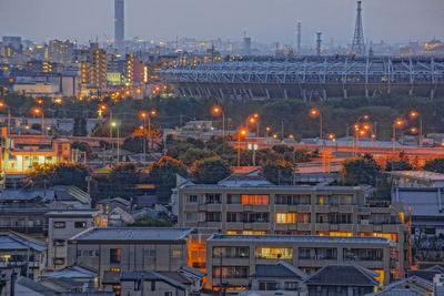 Illuminated buildings in city at night