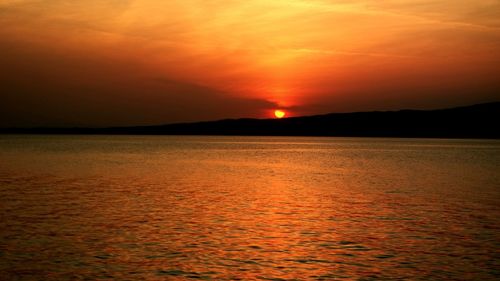 Scenic view of sunset over sea