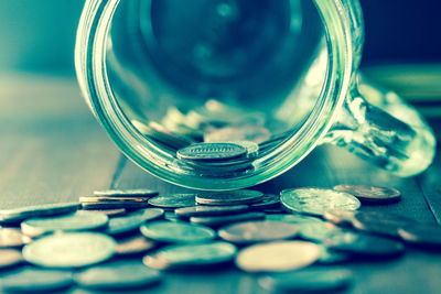 Close-up of coins on table