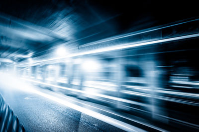 Light trails on illuminated city at night