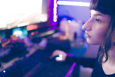 Close-up of young woman using laptop