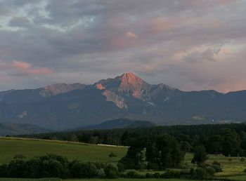 Scenic view of mountains against sky during sunset