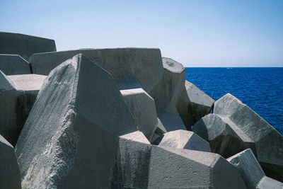 Cubic wave breaker stones on the shores of nice, france