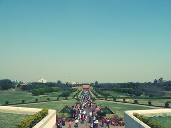 People on grassy field
