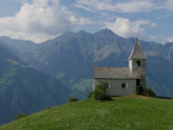 Landscape with mountain range in background