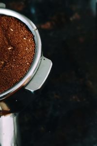 High angle view of coffee cup on table