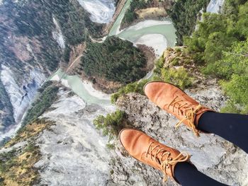 Low section of person at horseshoe bend