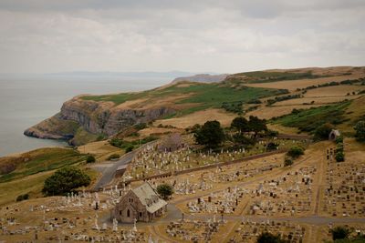 High angle view of church and cemetery against sky