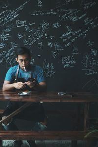 Young man using smart phone