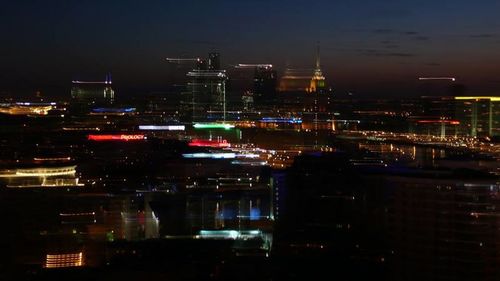 Illuminated cityscape at night