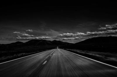 Road amidst landscape against sky
