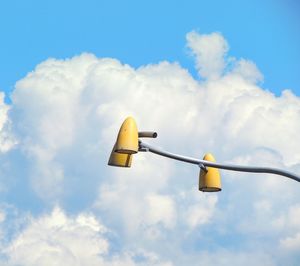 Low angle view of street light against sky