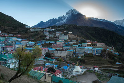 Panoramic view of buildings in city against clear sky