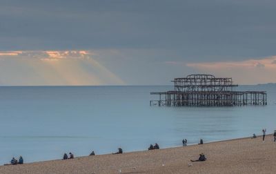 Scenic view of sea against sky at sunset