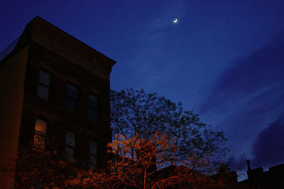 Low angle view of built structure against blue sky