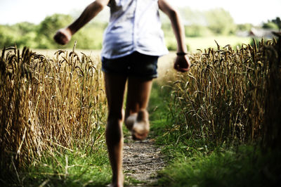 Child running through path
