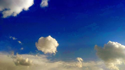 Low angle view of cloudscape against blue sky