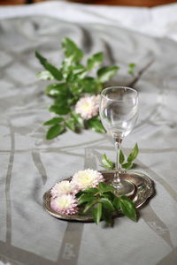 Close-up of wineglass on table