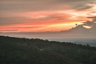 Scenic view of dramatic sky during sunset