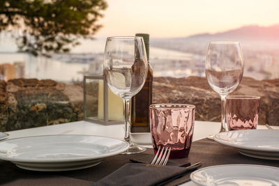 Glass of wine glasses on table