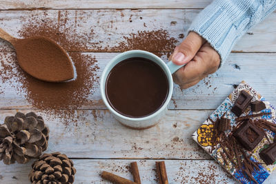 High angle view of coffee cup on table