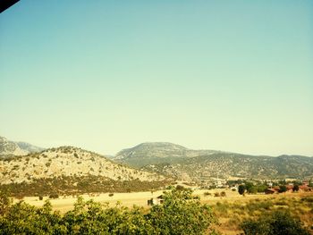 Scenic view of mountains against clear sky